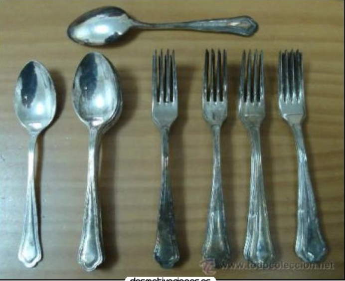 Antes: cubiertos mezclados y gastados